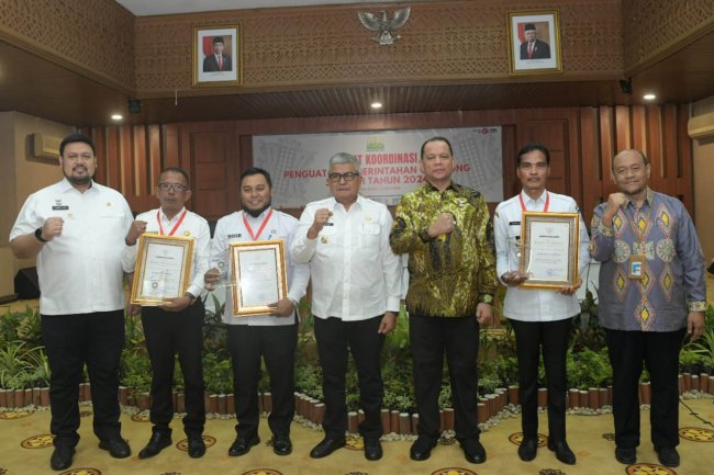 Foto Pj Gubernur Aceh Bustami Hamzah Buka Rakor Penguatan Pemerintah Gampong