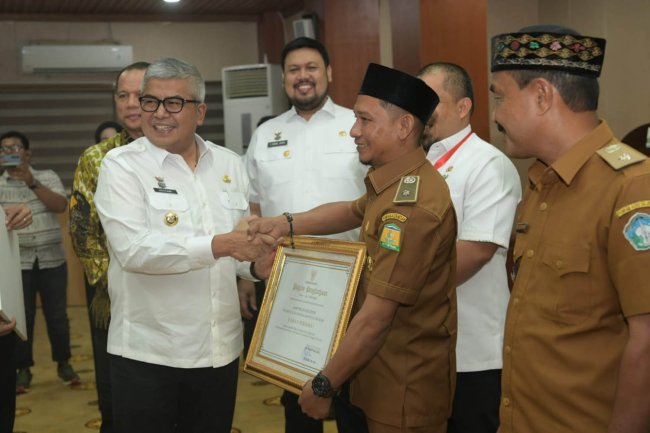 Foto Pj Gubernur Aceh Bustami Hamzah Buka Rakor Penguatan Pemerintah Gampong